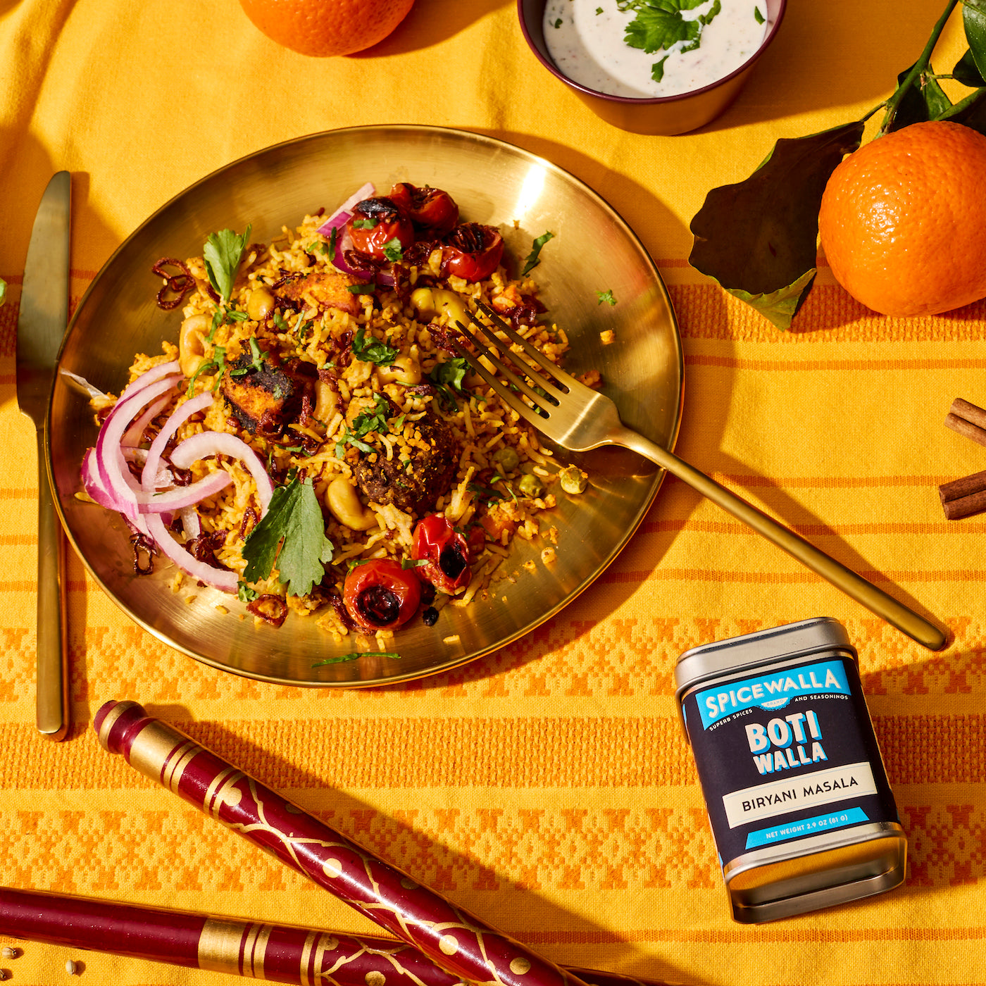Botiwalla Biryani Masala on a table with a Botiwalla signature salad