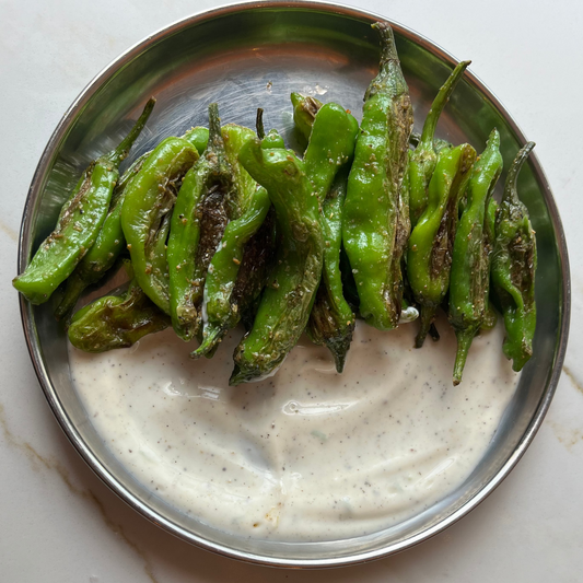 Blistered Shishitos with Black Pepper Lime Yogurt