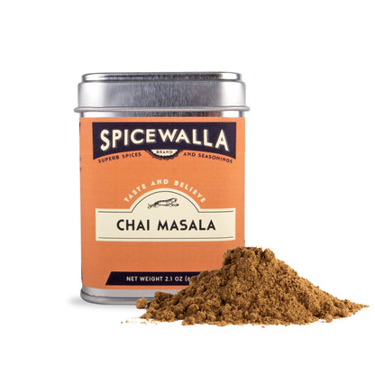 Spicewalla Chai Masala spice can with a small pile of spice on a white background