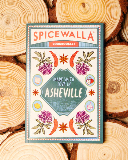 Spicewalla cookbooklet on a wooden background