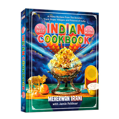 The front and spine of the book 'No. 1 Best Indian Cookbook in the World' by Meherwan Irani with Jamie Feldmar, featuring a vibrant, colorful cover illustration of a large bowl of Indian food against a dramatic blue sky background.