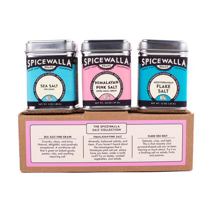 Three Spicewalla salt cans in a cardboard box on a white background