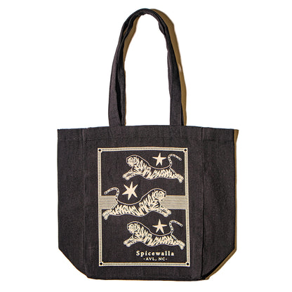 Black tote bag with white tiger design and 'Spiceworld' text on a white background