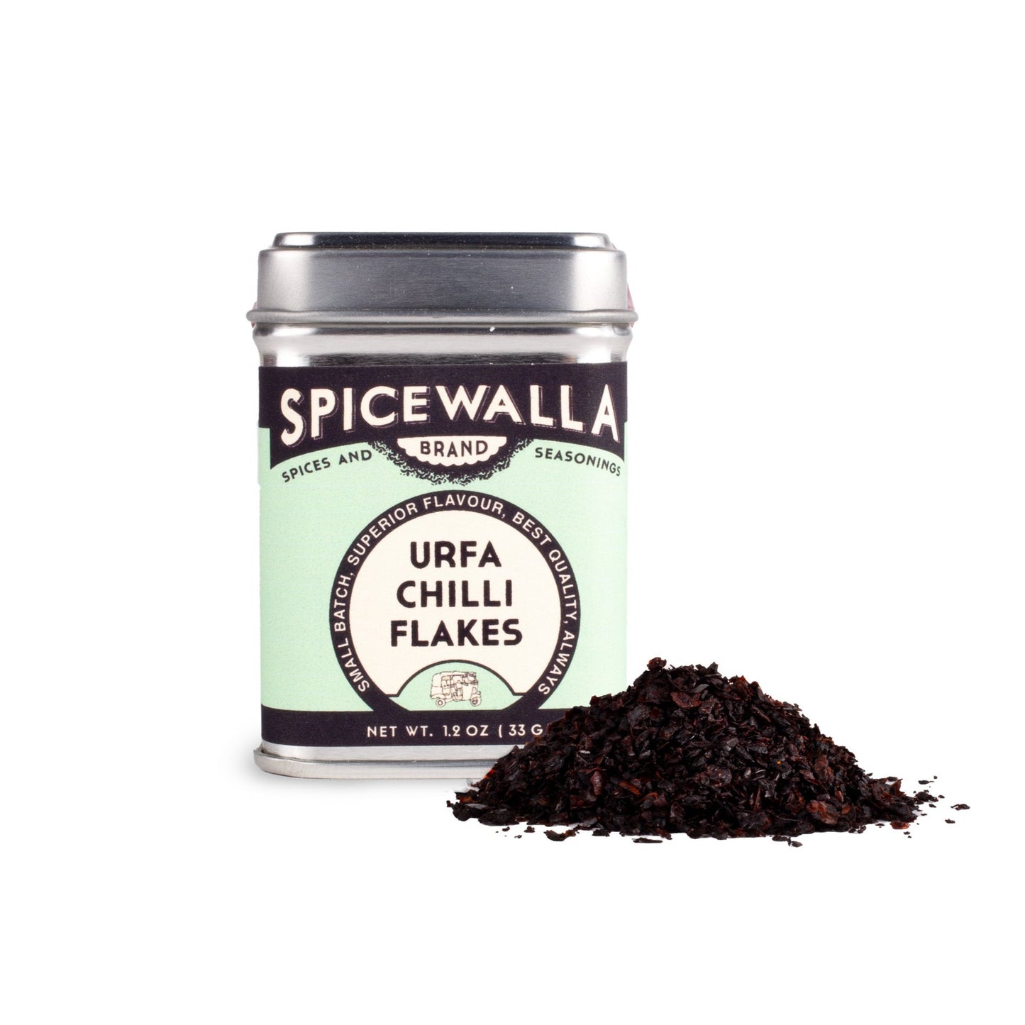 Spicewalla Urfá Chilli Flakes canister with a pile of chilies on a white background