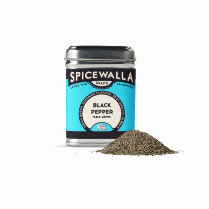 Spicewalla black pepper container with ground pepper on a white background