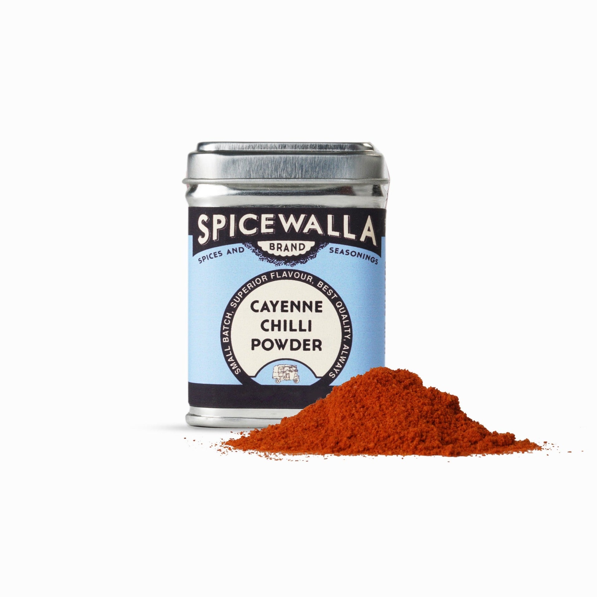 Spicewalla cayenne chili powder container with chili powder spilling out on a white background
