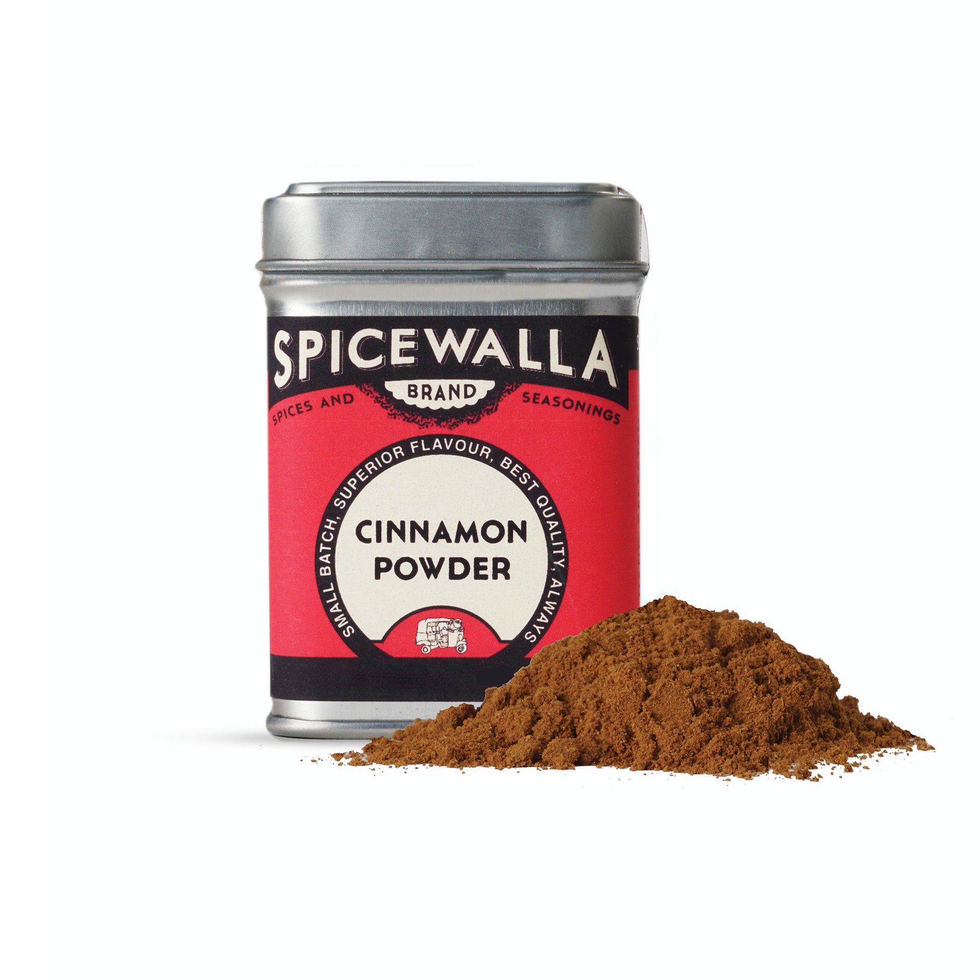 Spicewalla cinnamon powder canister with cinnamon powder spilling out on a white background