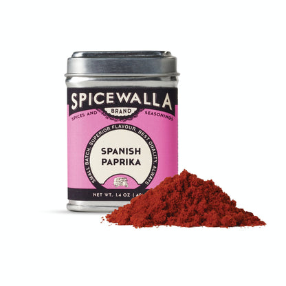 Spicewalla Spanish Paprika can with red spice powder on a white background
